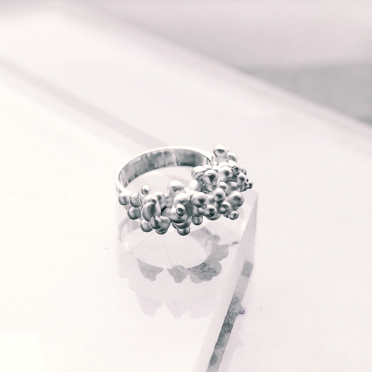 Particle Statement Silver Ring